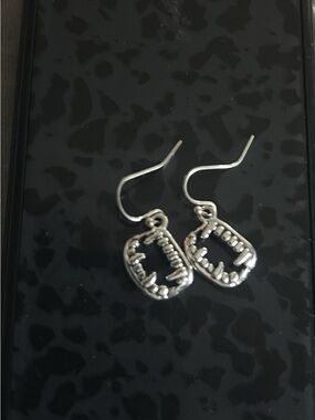 Silver Tone Dangle Earrings with Textured Oval Charms